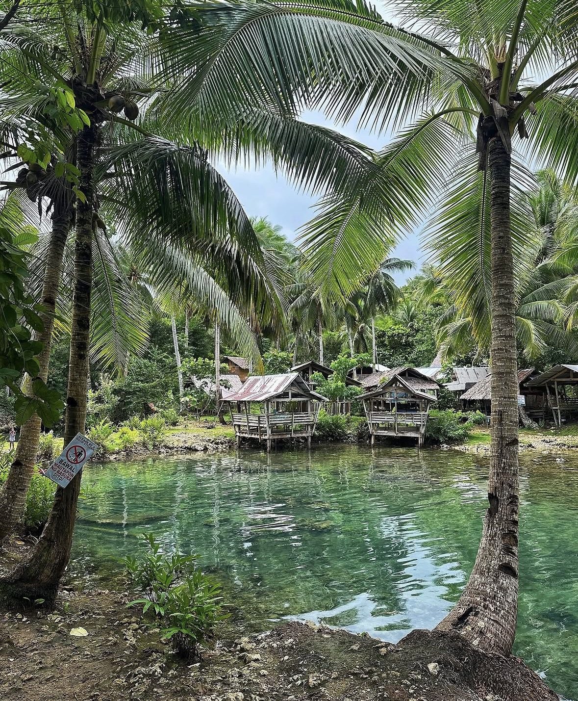 Packed dry bag and snorkel gear ready for a day of Siargao Island Hopping
